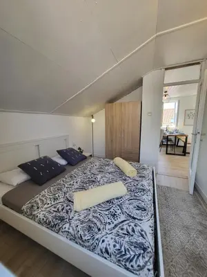 Krevet ili kreveti u jedinici u objektu ApartmaniinPrimosten