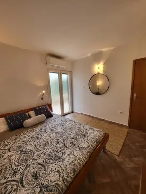Krevet ili kreveti u jedinici u objektu ApartmaniinPrimosten