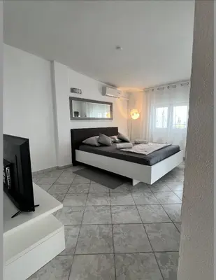 Krevet ili kreveti u jedinici u objektu Seaview Sunset Apartment - Big Terrace to Enjoy the Sunset