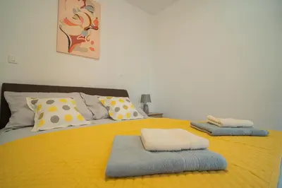 Krevet ili kreveti u jedinici u objektu Tisno Laurel Apartments