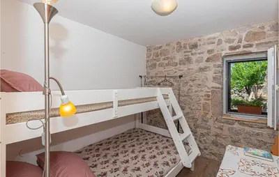 Krevet ili kreveti u jedinici u objektu Awesome Home In Kaprije With Wifi