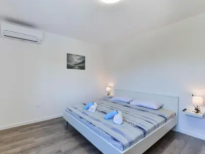 Krevet ili kreveti u jedinici u objektu Holiday Home Gušt by Interhome