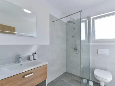 Kupaonica u objektu Holiday Home Gušt by Interhome