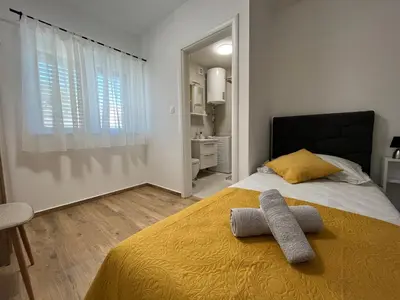 Krevet ili kreveti u jedinici u objektu Apartments Nino