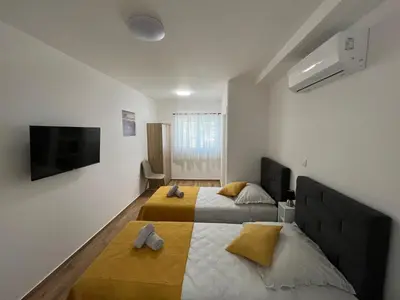 Krevet ili kreveti u jedinici u objektu Apartments Nino