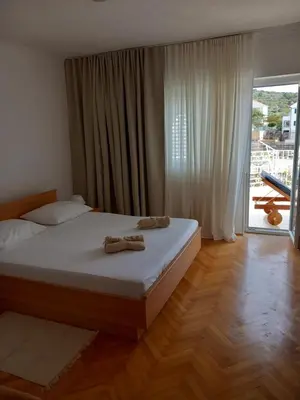 Krevet ili kreveti u jedinici u objektu APARTMANI BLAŽE