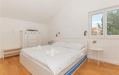 Krevet ili kreveti u jedinici u objektu 3 Bedroom Amazing Home In Vodice